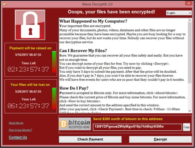 Hacker demanding cryptocurrency ransom on a laptop screen.